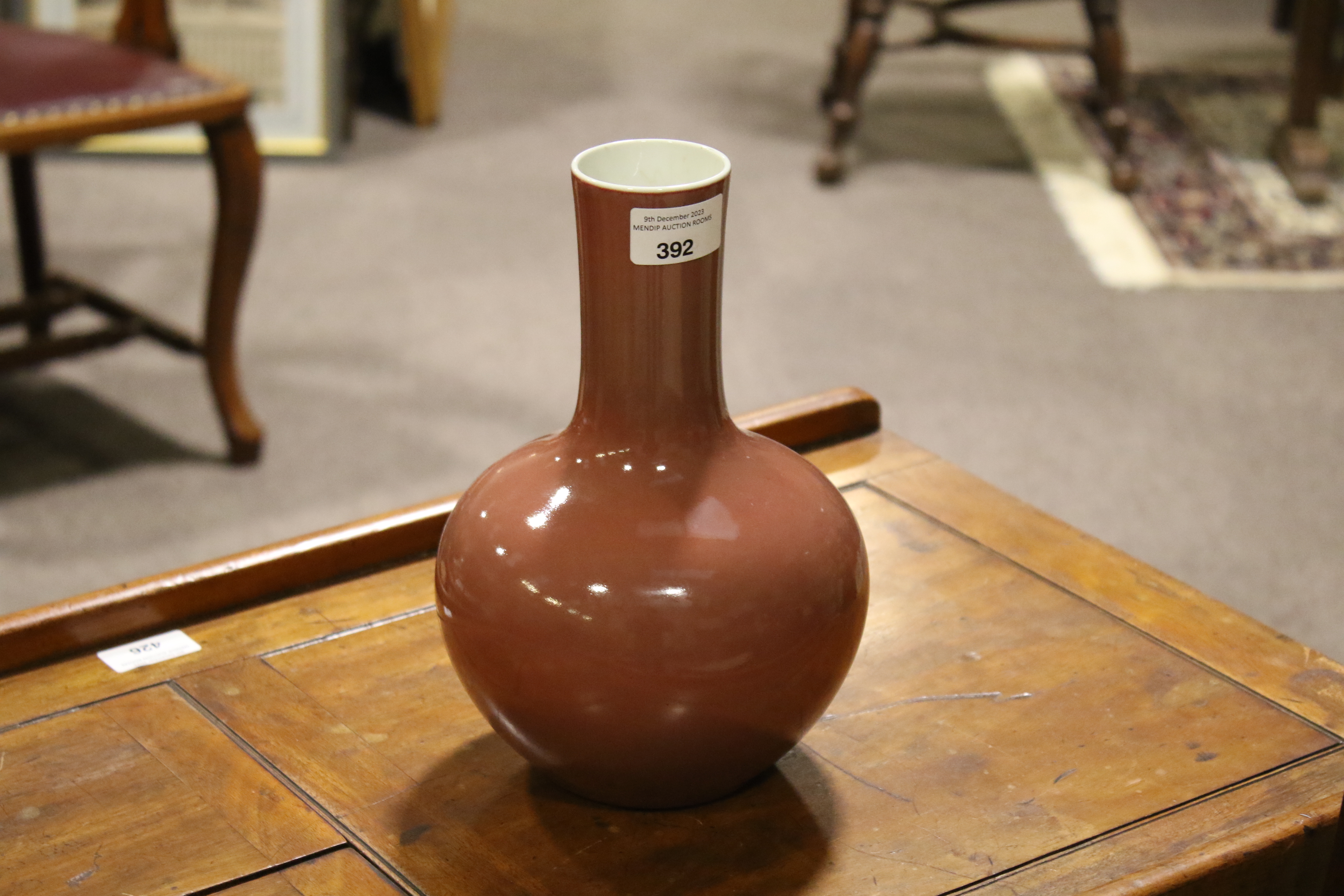 A Chinese copper-red tianquiping form bottle vase. Six character Qianlong mark to base. H24cm. - Image 10 of 17