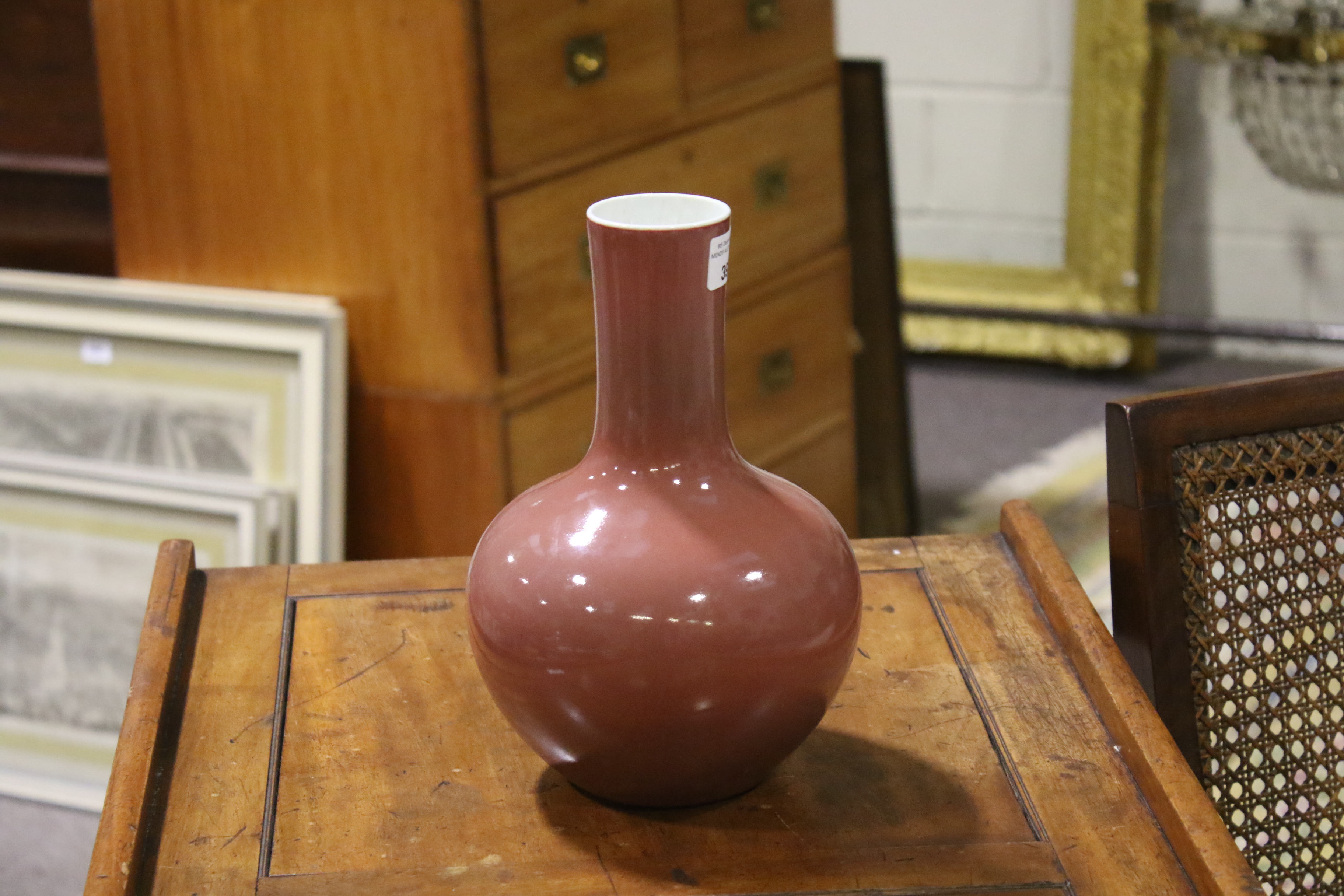 A Chinese copper-red tianquiping form bottle vase. Six character Qianlong mark to base. H24cm. - Image 13 of 17