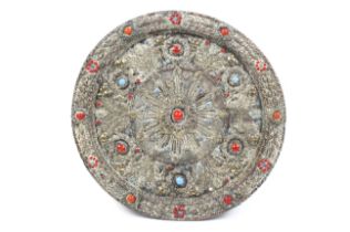 A circa 1900 East Asian circular adazed back wooden plate/plaque.