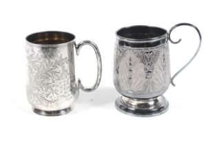 Two christening mugs including a Victorian silver example with a loop handle and engraved with a