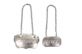 Two George silver decanter labels including an Irish cartouche-shaped example 'Sherry'.