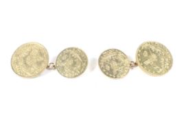 A pair of Iraqi coin cufflinks. Each link formed of a larger (17.