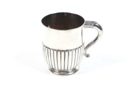 A Victorian silver part fluted christening mug.