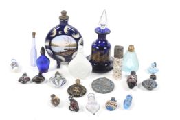 A collection of 19th century and later glass scent bottles to include a Nailses small drop-shaped