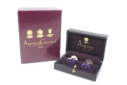 Asprey & Garrard, a pair of vintage silver and enamel oval twin-panel cufflinks.