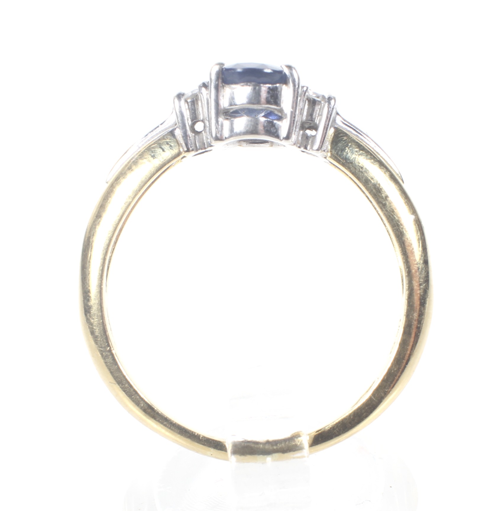 A modern 18ct gold, sapphire and diamond three stone ring. - Image 4 of 6