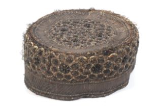A fine silver thread embroidered Islamic Fez or Rabat prayer hat with material lining under. H6.