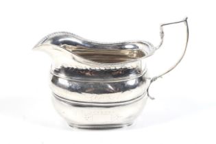 A George IV Irish silver oblong milk jug.