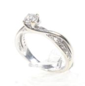 Forever Diamond, an 18ct white gold and diamond ring. Centred with a round brilliant diamond approx.