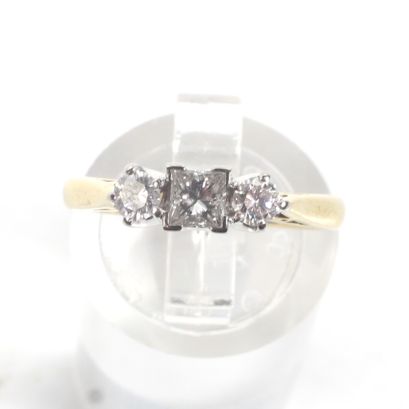 A modern 18ct gold and diamond three stone ring. - Image 2 of 4