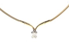 A modern 18ct gold and diamond pendant necklace.