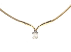 A modern 18ct gold and diamond pendant necklace.