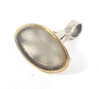 A 19th century gold and chalcedony marquise-shaped fob seal.