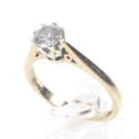 A vintage 9ct white and yellow gold and diamond solitaire ring. The round brilliant approx. 0.