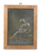 Emmanuel Hannaux (1855-1934) (HANNAVX), patinated bronze plaque depicting a seated woman.