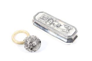 A late Victorian silver box and a child's rattle.