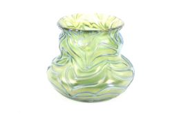 An Art Noveau Loetz style green iridescent glass vase.
