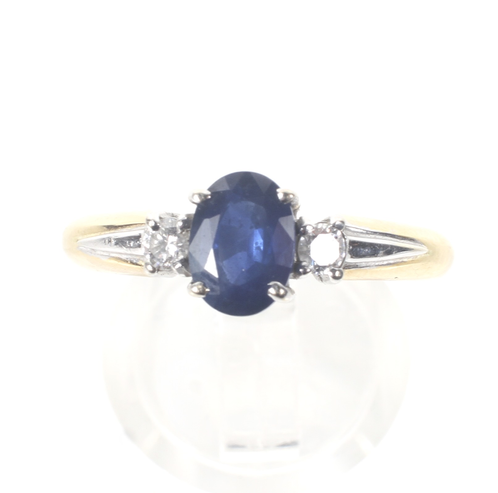A modern 18ct gold, sapphire and diamond three stone ring. - Image 2 of 6