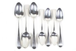 Four George III silver old English thread pattern dessert spoons and three old English pattern
