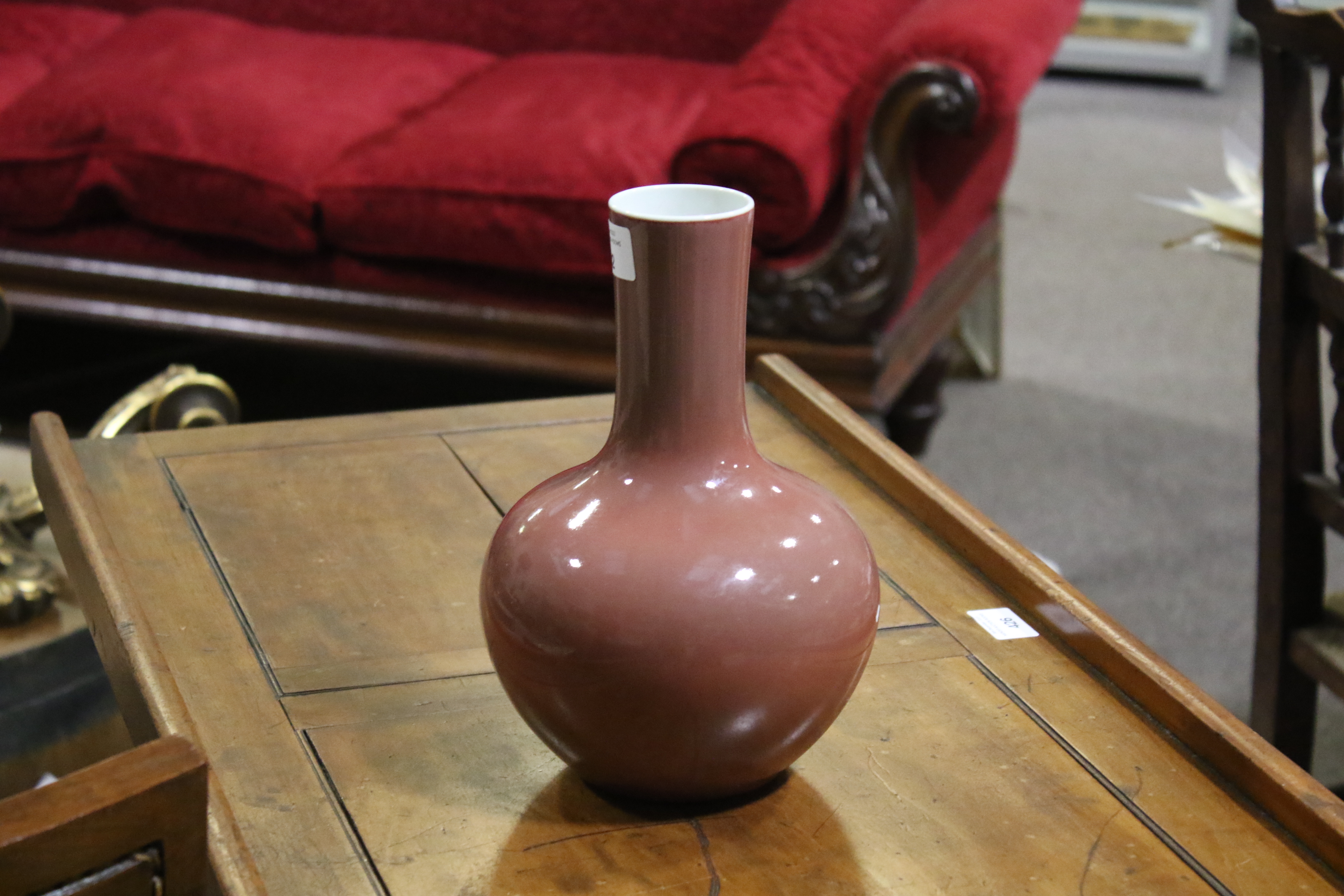 A Chinese copper-red tianquiping form bottle vase. Six character Qianlong mark to base. H24cm. - Image 11 of 17