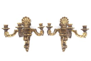 A pair of 18th century carved wooden 'Chippendale' three-branch wall brackets.