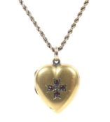 An early 20th century rose-gold rope twist necklace hung with a gold-plated heart-shaped locket.