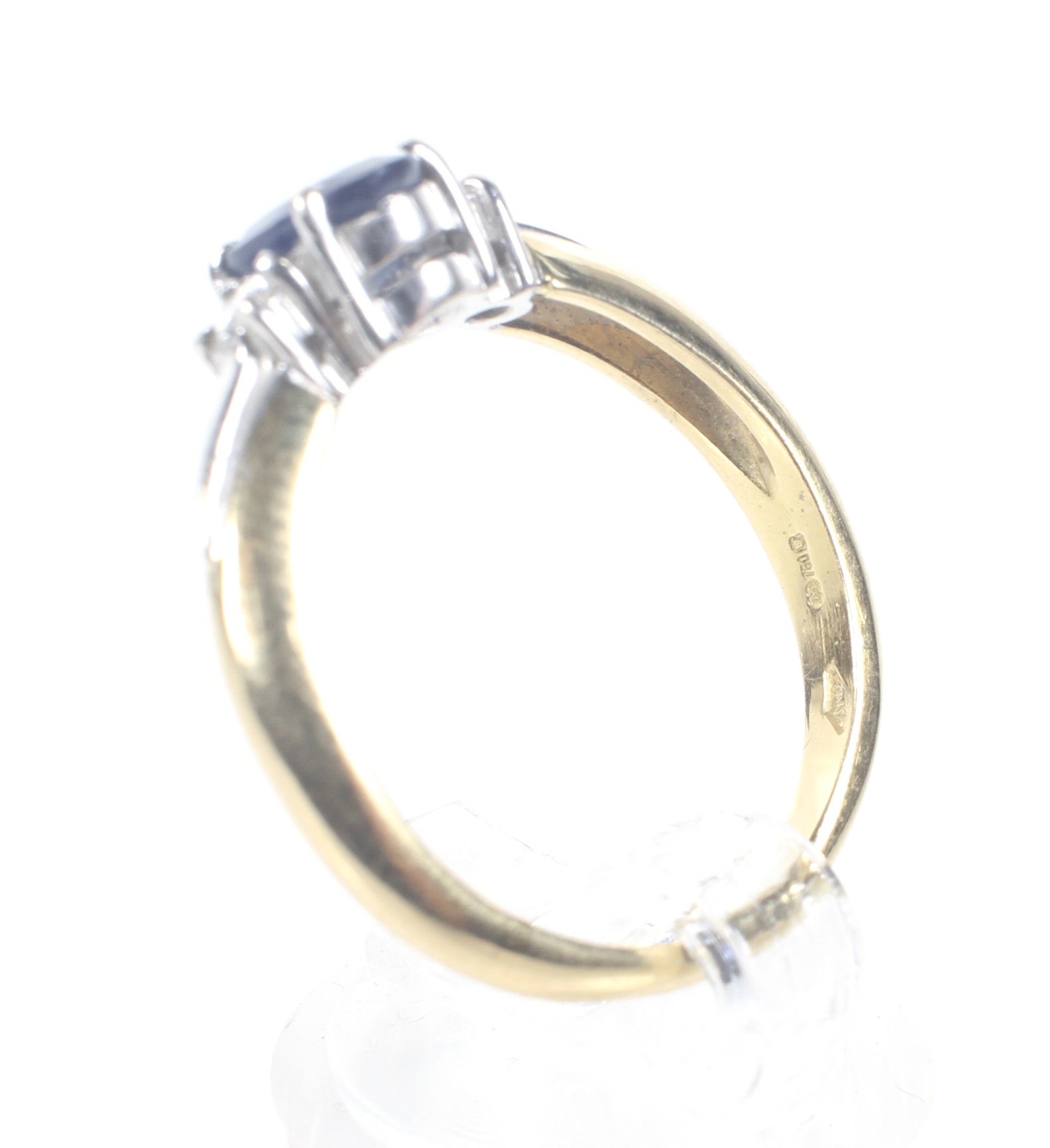 A modern 18ct gold, sapphire and diamond three stone ring. - Image 3 of 6