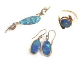 A collection of gold and black-opal-doublet jewellery to include a single stone ring.