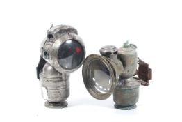 Two early Motorcycle Carbide lamps : A Powell & Hammer 'Vulture' lamp and a 'Jos Lucas Ltd 'ACETA