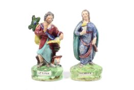 Two 18th century Staffordshire hollow based figures of Saints. Comprising St.