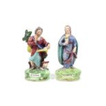 Two 18th century Staffordshire hollow based figures of Saints. Comprising St.