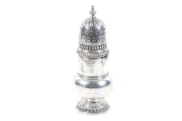 A silver baluster sugar caster in George II style, The pierced,