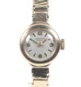 J.W. Benson, a lady's 9ct gold cased bracelet watch, circa 1960.