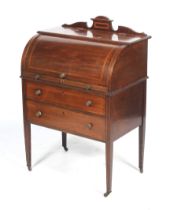 An Edwardian inlaid and crossbanded mahogany bureau.