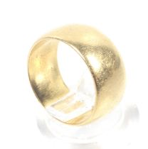 An early 20th century 22ct gold broad wedding band.