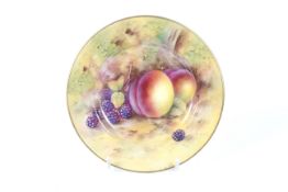 A Royal Worcester puce marked hand painted side dish. Signed 'M Ayrton', diameter 15.