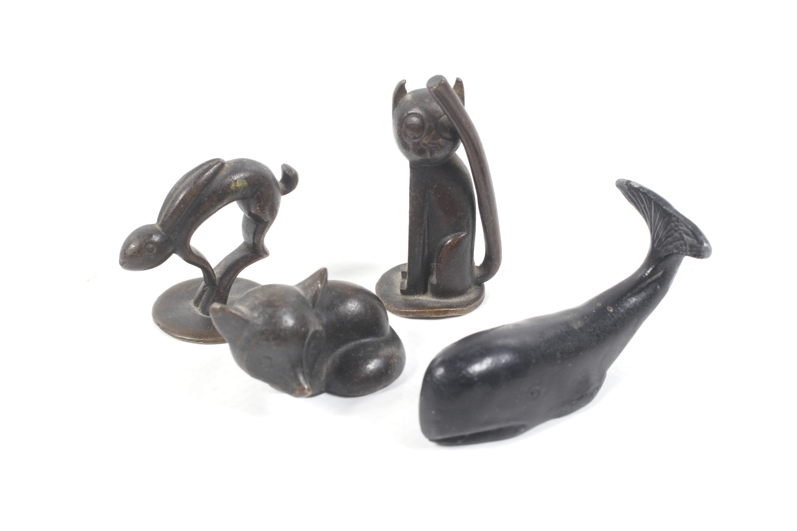 Four contemporary miniature bronze animals.