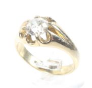 An early 20th century gold and diamond solitaire gypsy ring. The old-cut stone approx. 1.