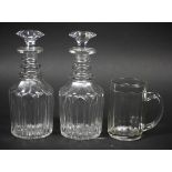 A pair of Georgian glass mallet decanters and a pint mug.