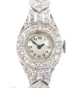 Cyma, an Art Deco lady's platinum and diamond bracelet watch, circa 1930.
