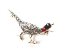 An early-mid 20th century diamond and enamel 'pheasant' brooch,