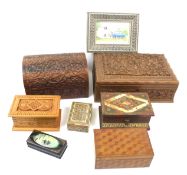 A collection of boxes. Including carved wood en examples, inlaid lacquer examples, etc. Max.