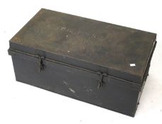 A metal travelling trunk. Painted black with handles to the ends, H32.