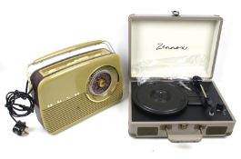 A retro Bush 'Antique Radio' and a Zennox briefcase turntable.