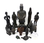An assortment of collectables. Including ceramic figures, carved animals, etc. Max.