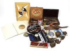 A box of assorted vintage collectables.