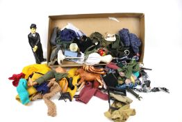 A quantity of vintage Action Man accessories. Including a boxer dog, clothes, etc. Max.