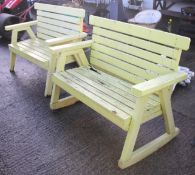 Two wooden garden benches.