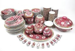 A large Chinese famille rose dinner service. Including bowls, plates, chopstick rests, etc.