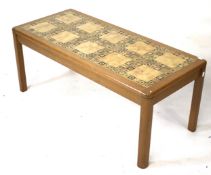 A Nathan Mid-century tile top coffee table.